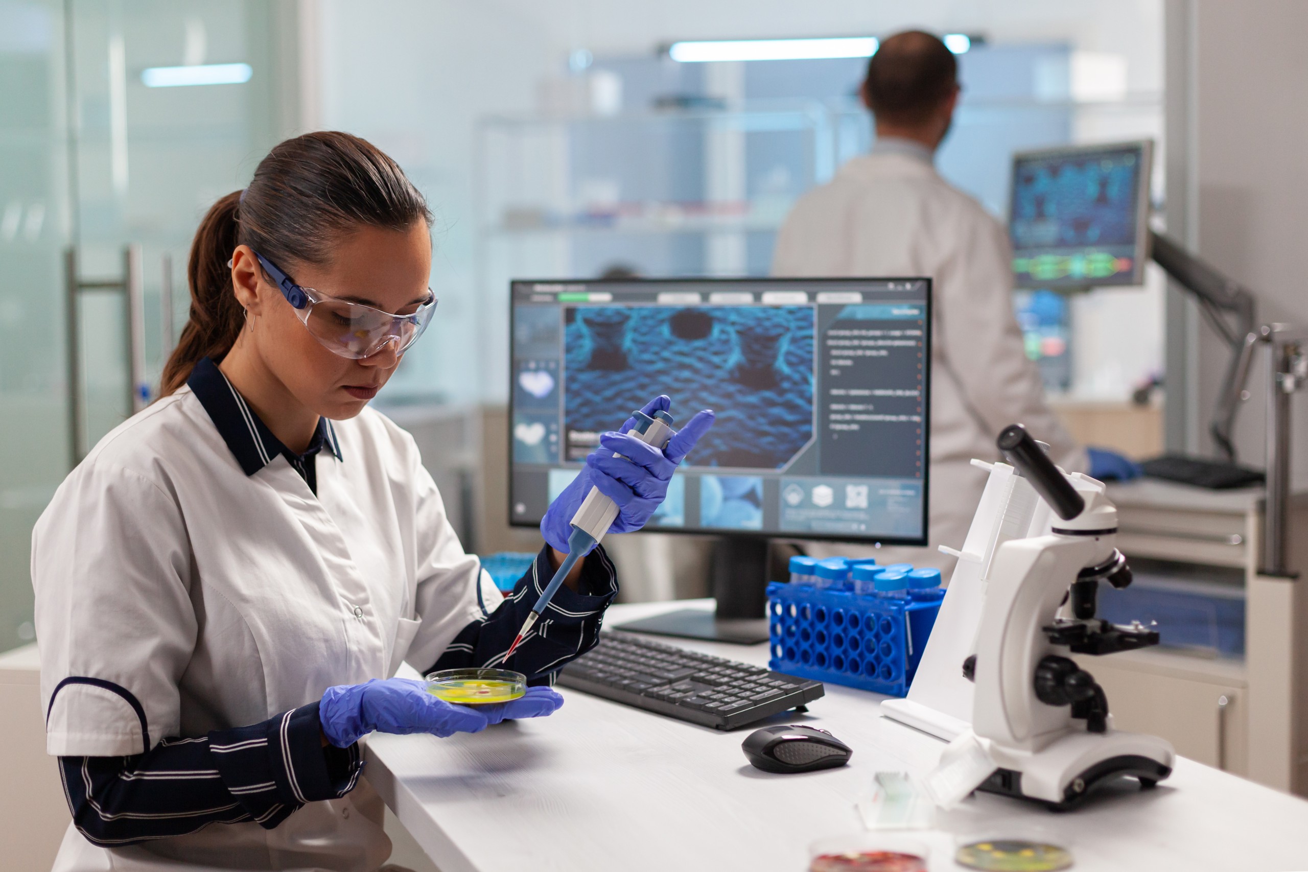 doctor-scientist-conducting-clinical-experiment-using-micropipette (1)